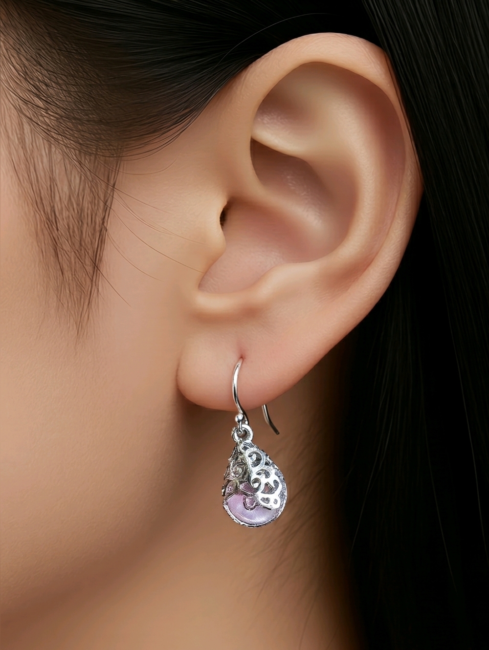 Silver Teardrop Earrings With A Lilac Colored Stone